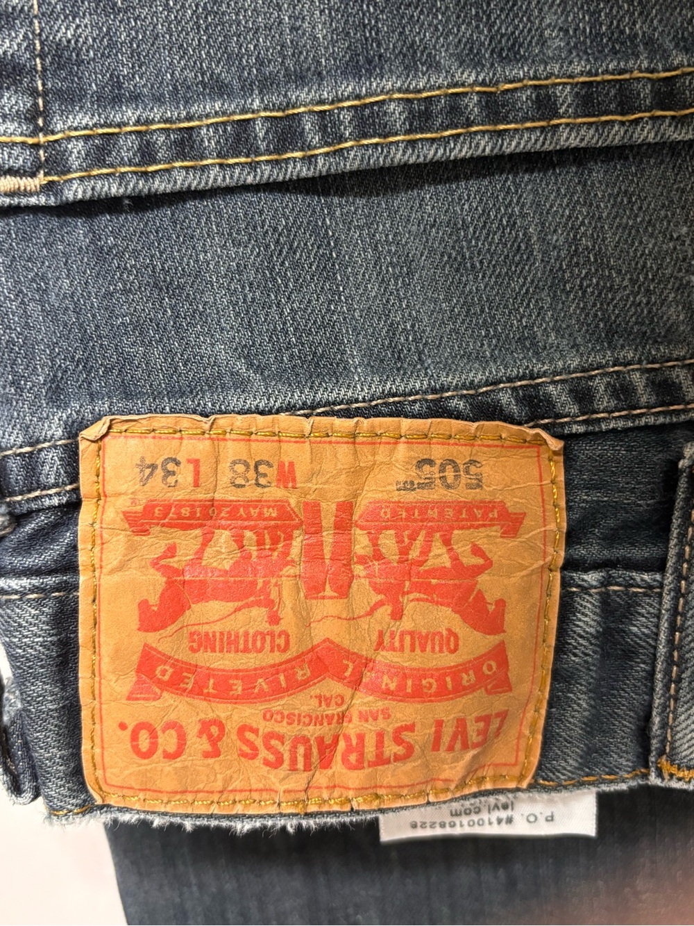 Levi's Relaxed Fit Denim Jeans in Medium Blue with Tan Patch 38X34
